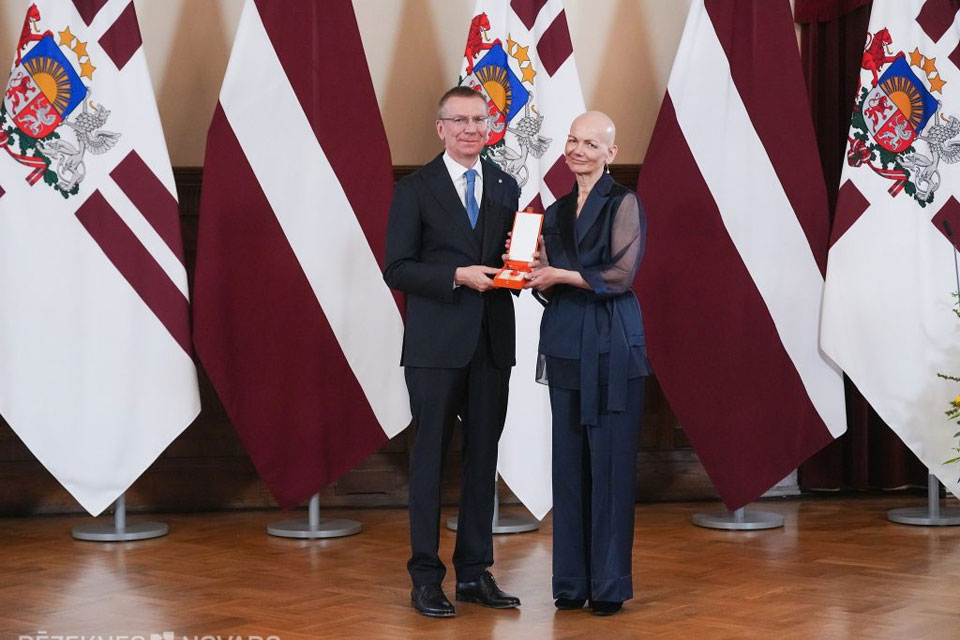 SAŅEM ATZINĪBAS KRUSTU
